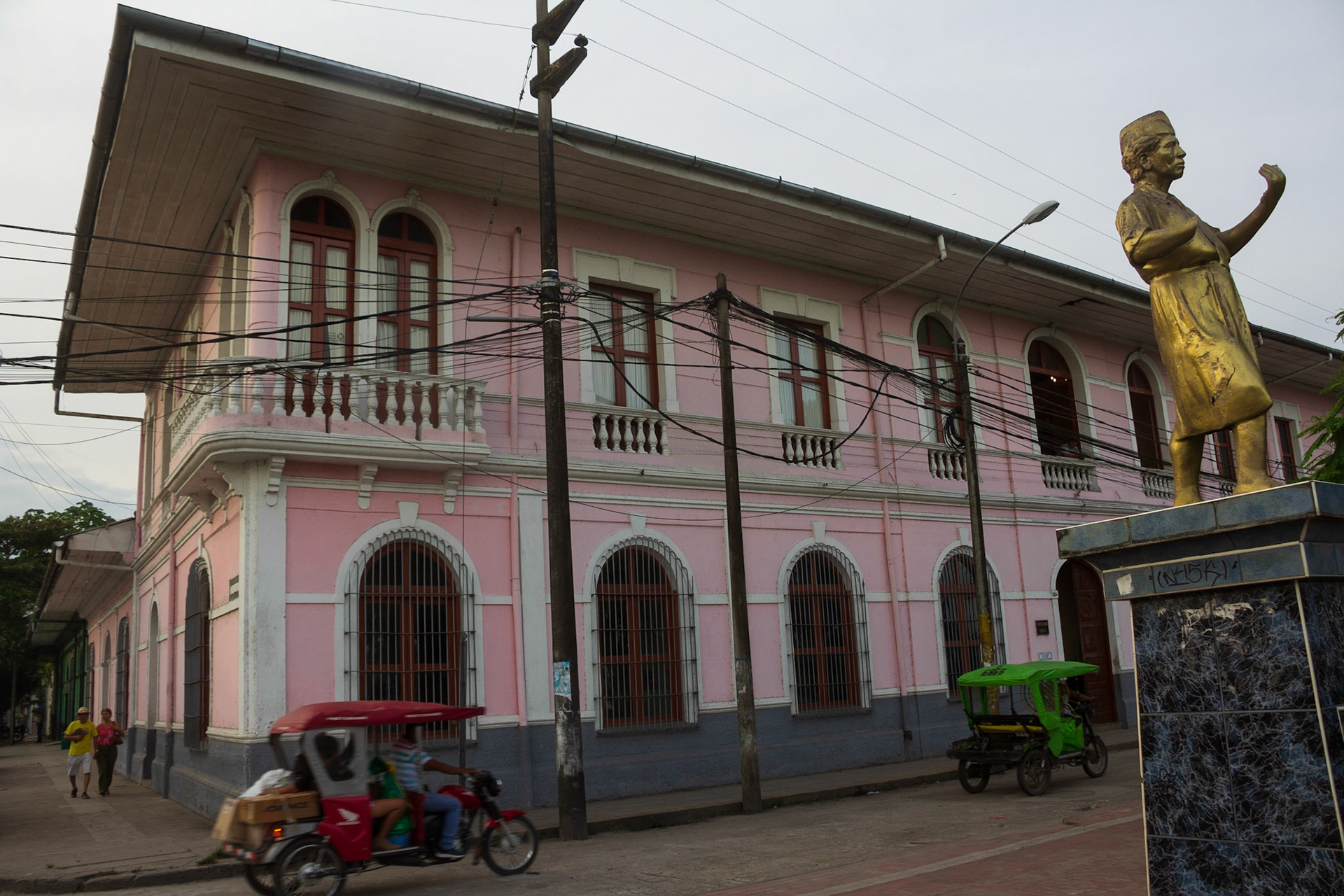 Inca figure and motor trycycle