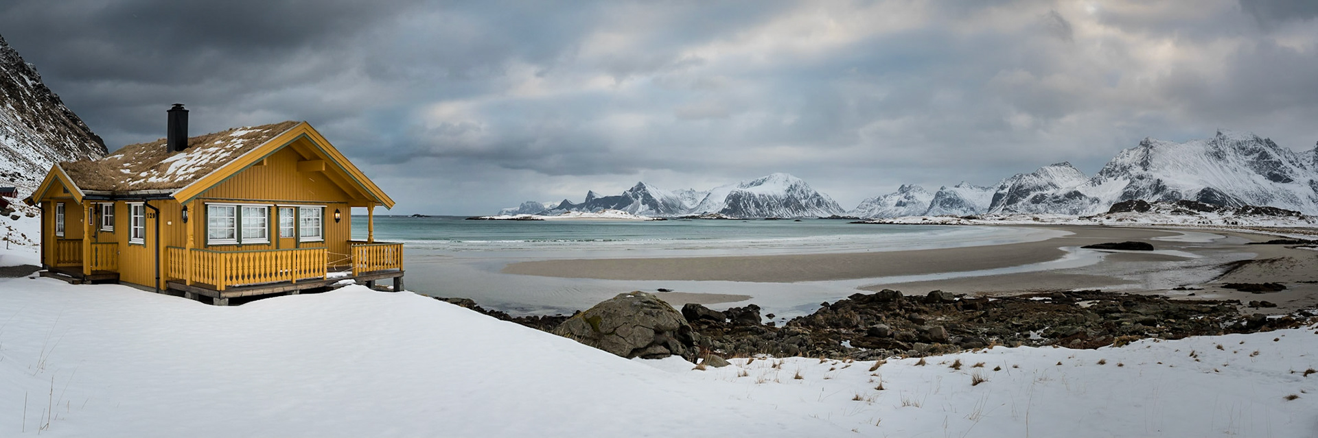 Yellow house on Fredvang Beach, panorama