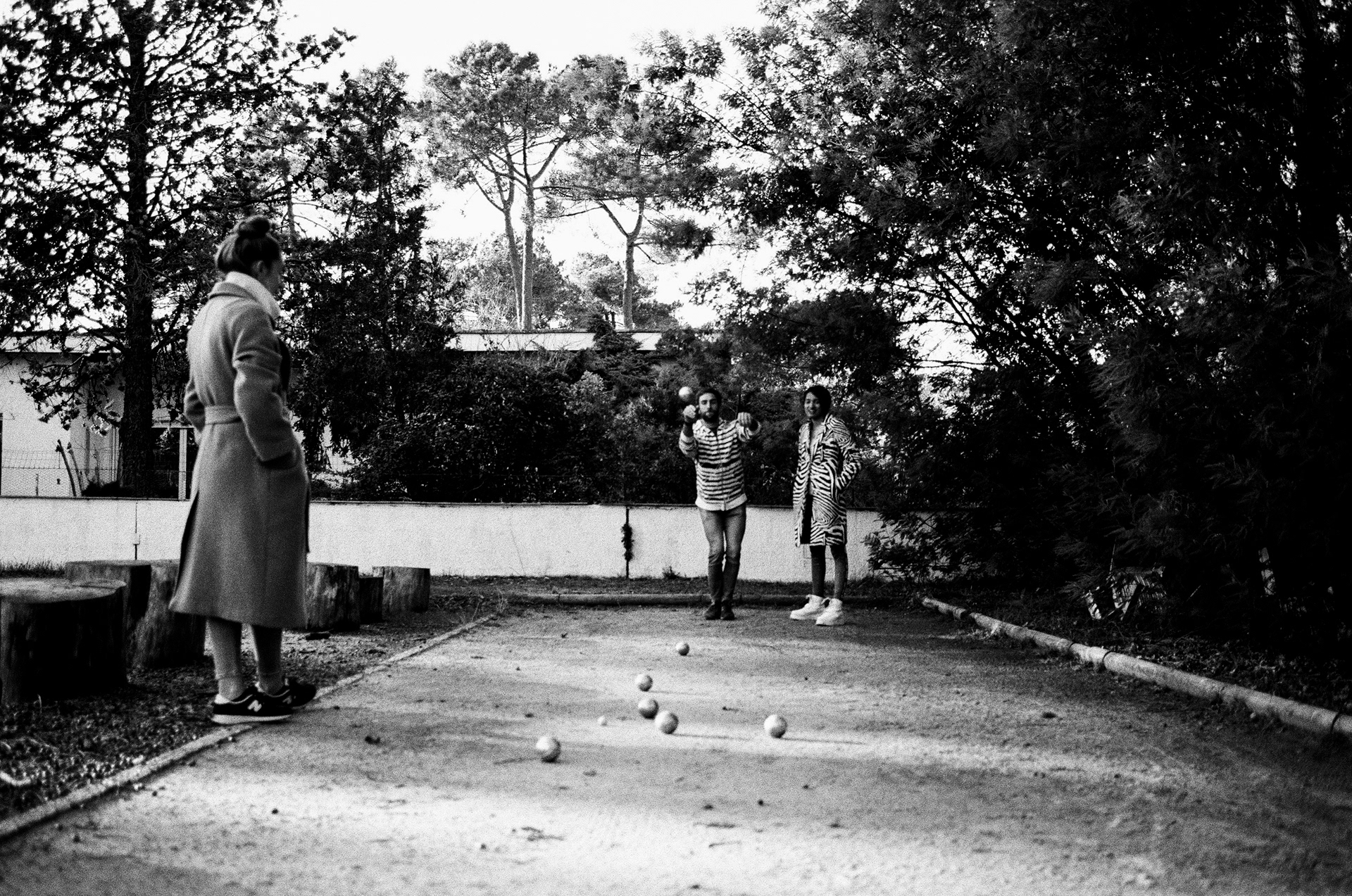 People playing pétanque in Petit Piquey