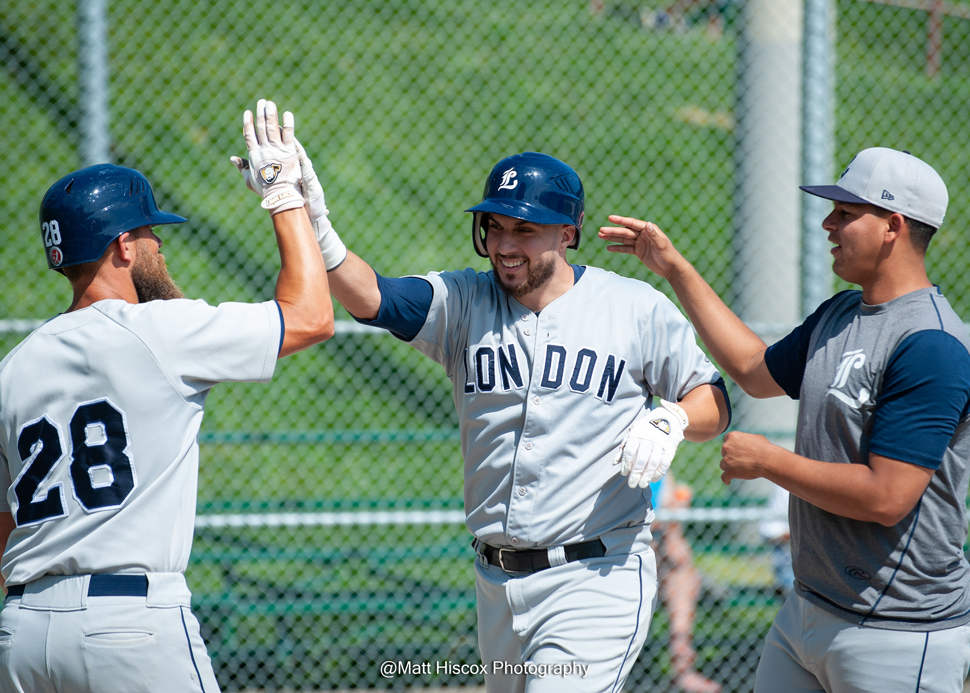 Steve Froese high fives Ismael Pena