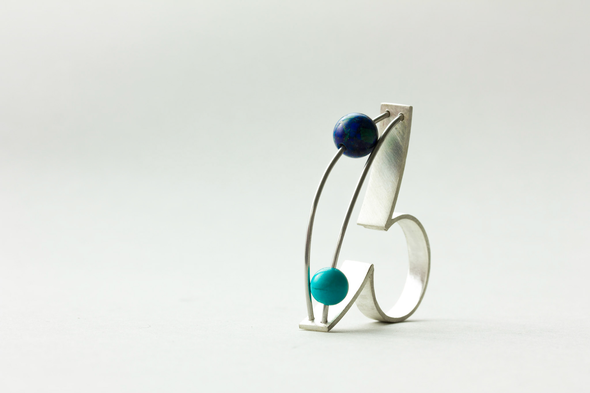 Orbis Sphaere ring. Silver, stainless steel, azurite, turquoise.