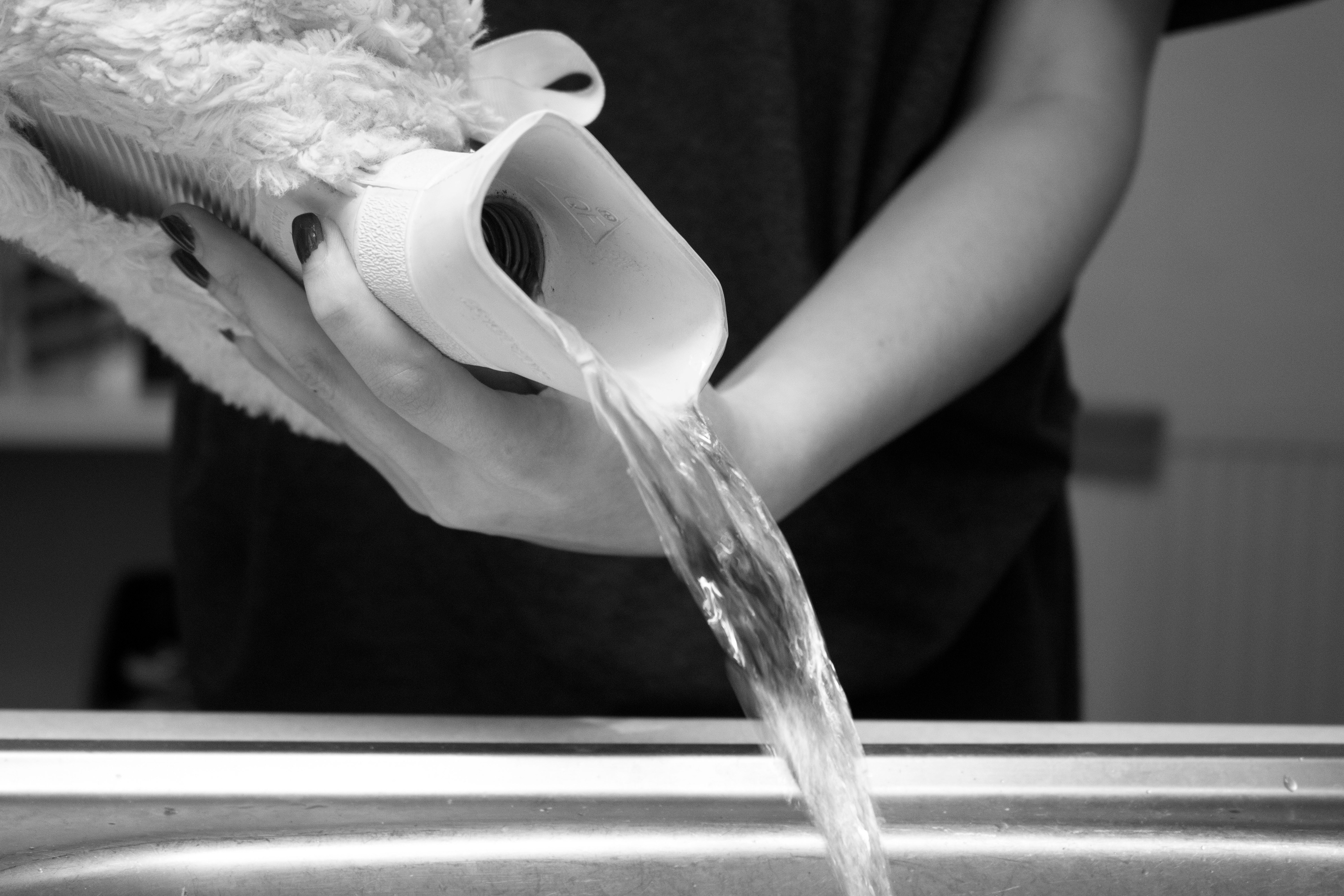 Hot water bottle being emptied