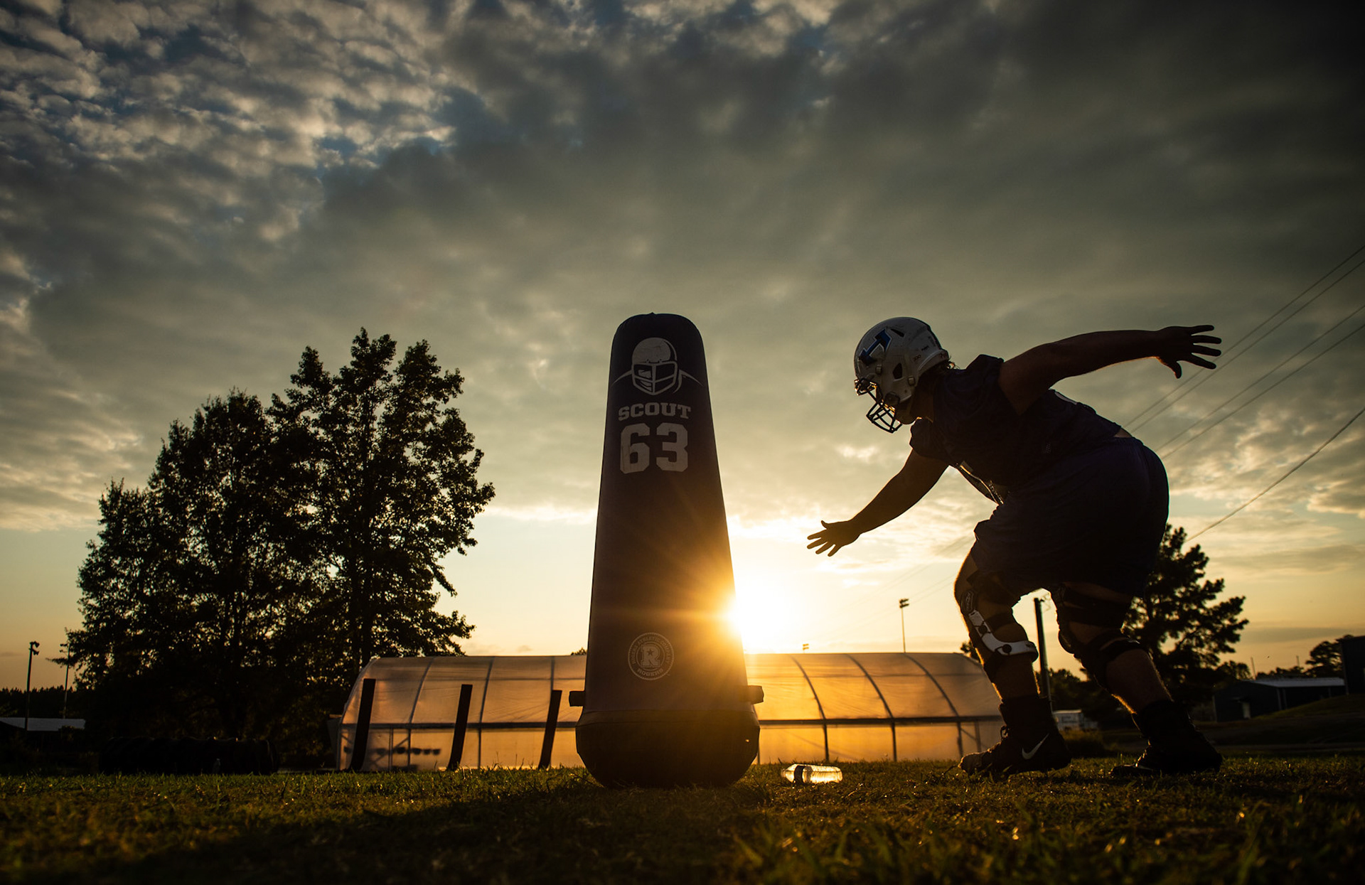 Hatton's Aiden Smith works on a lineman drill during football practice on Tuesday, August 4, 2020, in Hatton, Ala.