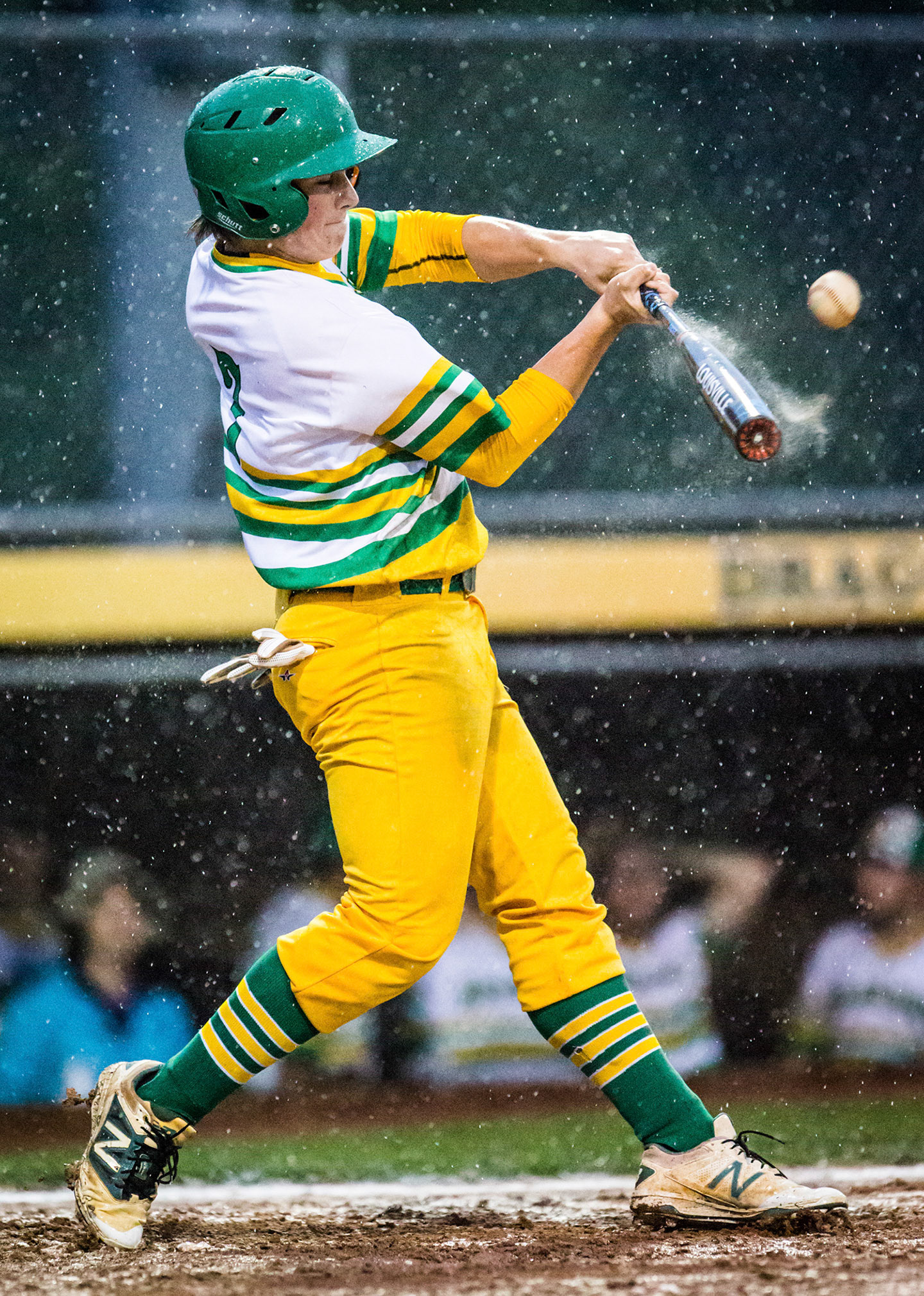 West Davidson's Austin Musgrave bats against Central Davidson in the rain during their game on April 26, 2018 at West Davidson High school in Lexington, North Carolina.