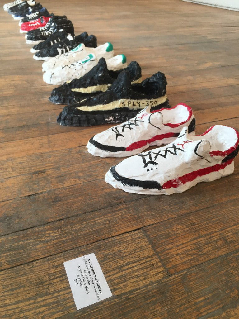 DETAIL: “If He Has More Than 10 Pairs Of Sneakers He’s A Fuckboy” 9ft x 1ft, Acrylic, ink, newspaper and plaster, 2017