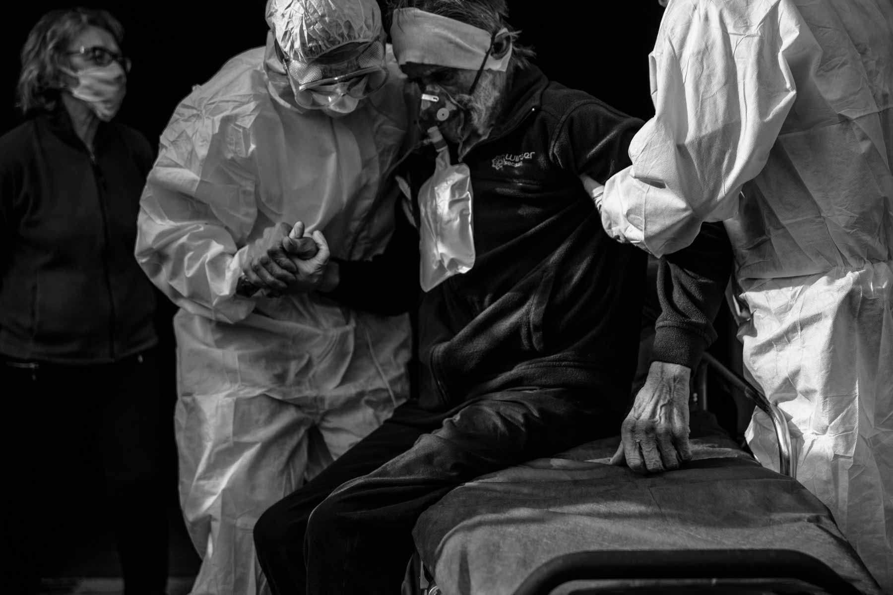 BC first responder helping a Covid Patient