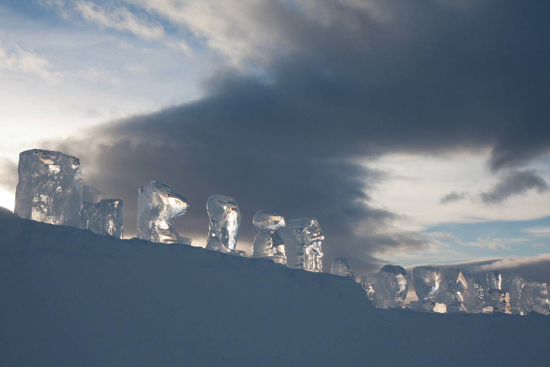 Attempts at ice sculpture lined up on a wall