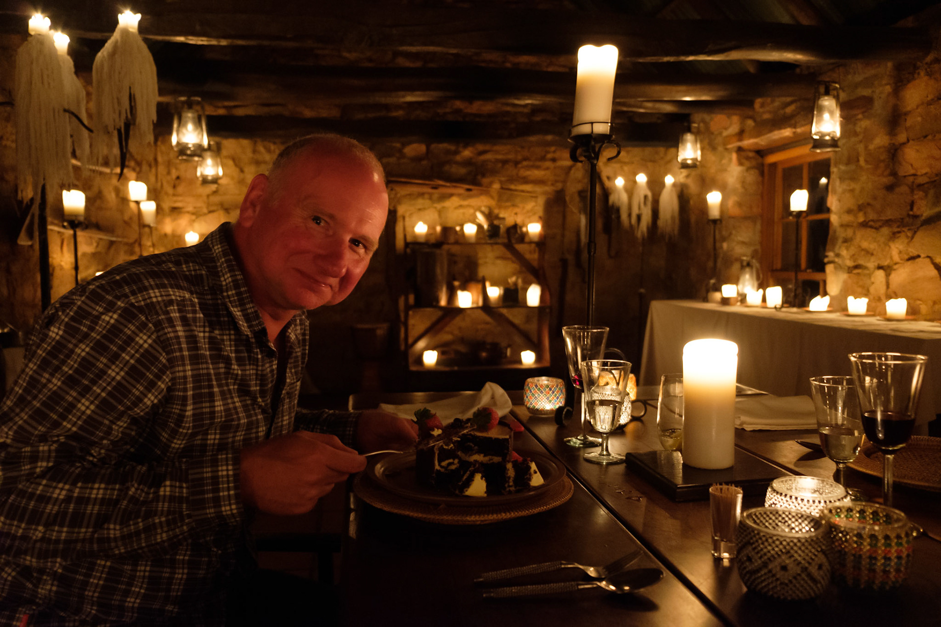 Cutting his birthday cake
