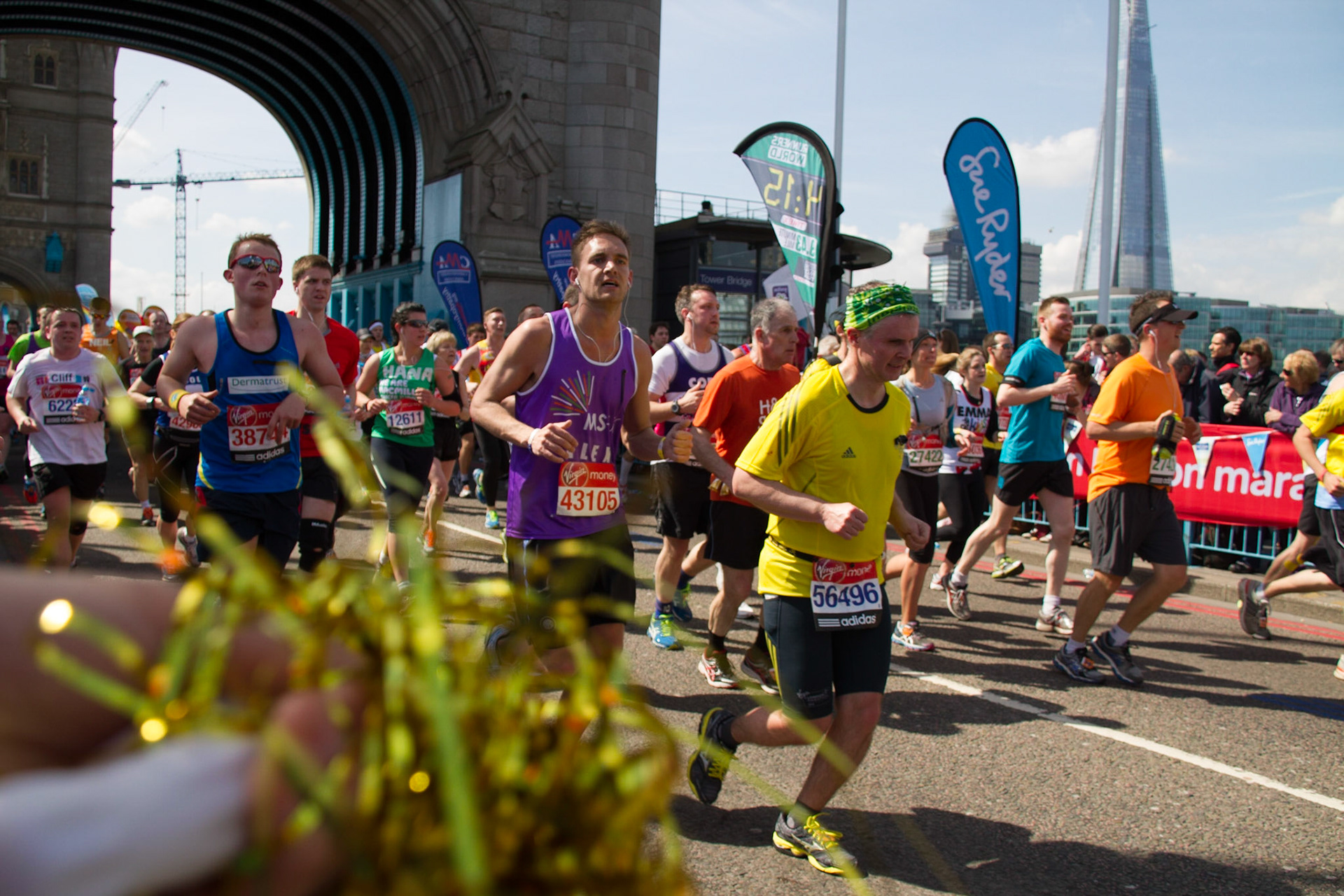 4hr15 runners crossing Tower Bridge