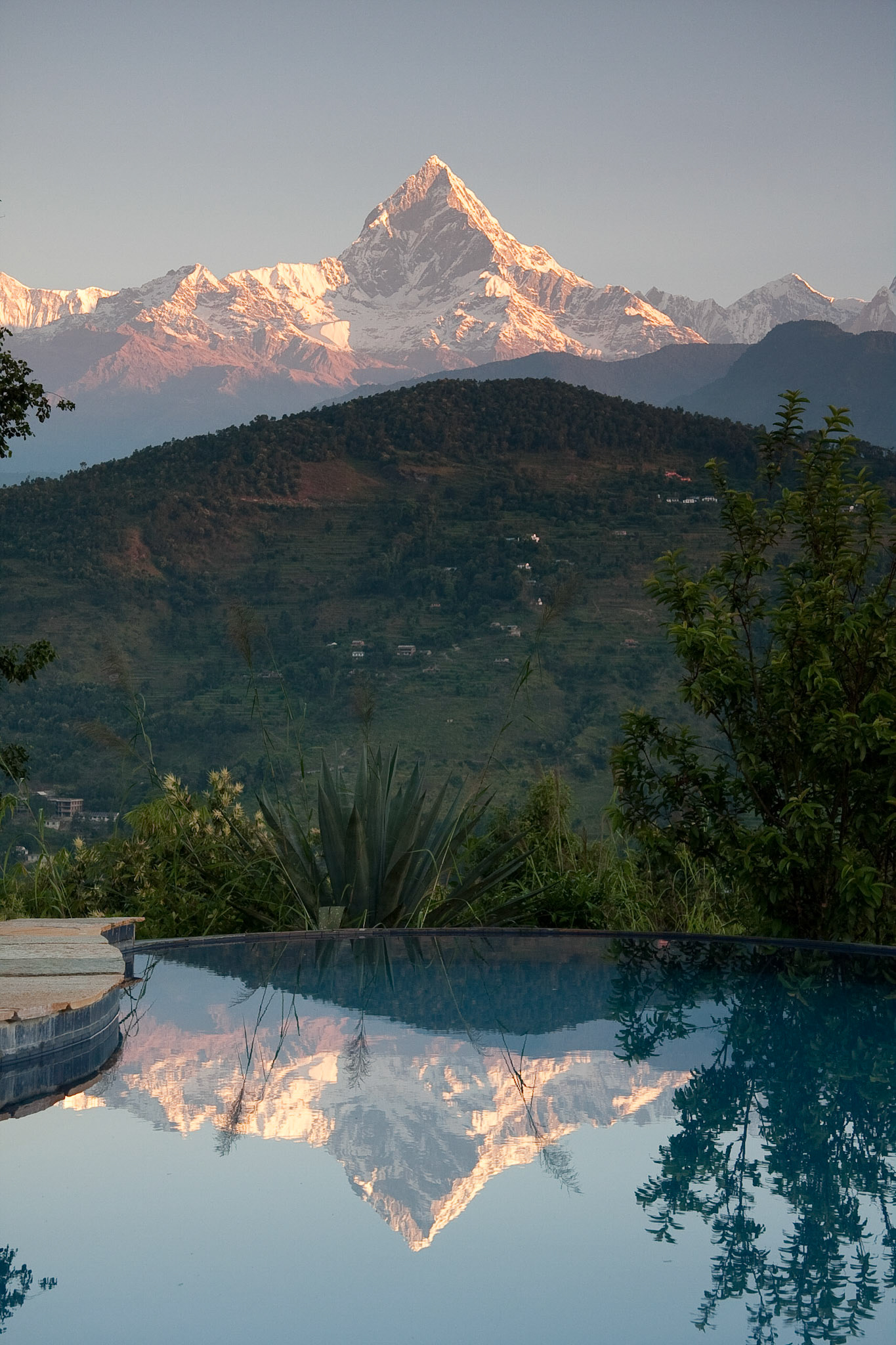 Fish Tail at sunrise and reflection in pool at Tiger Mtn Lodge