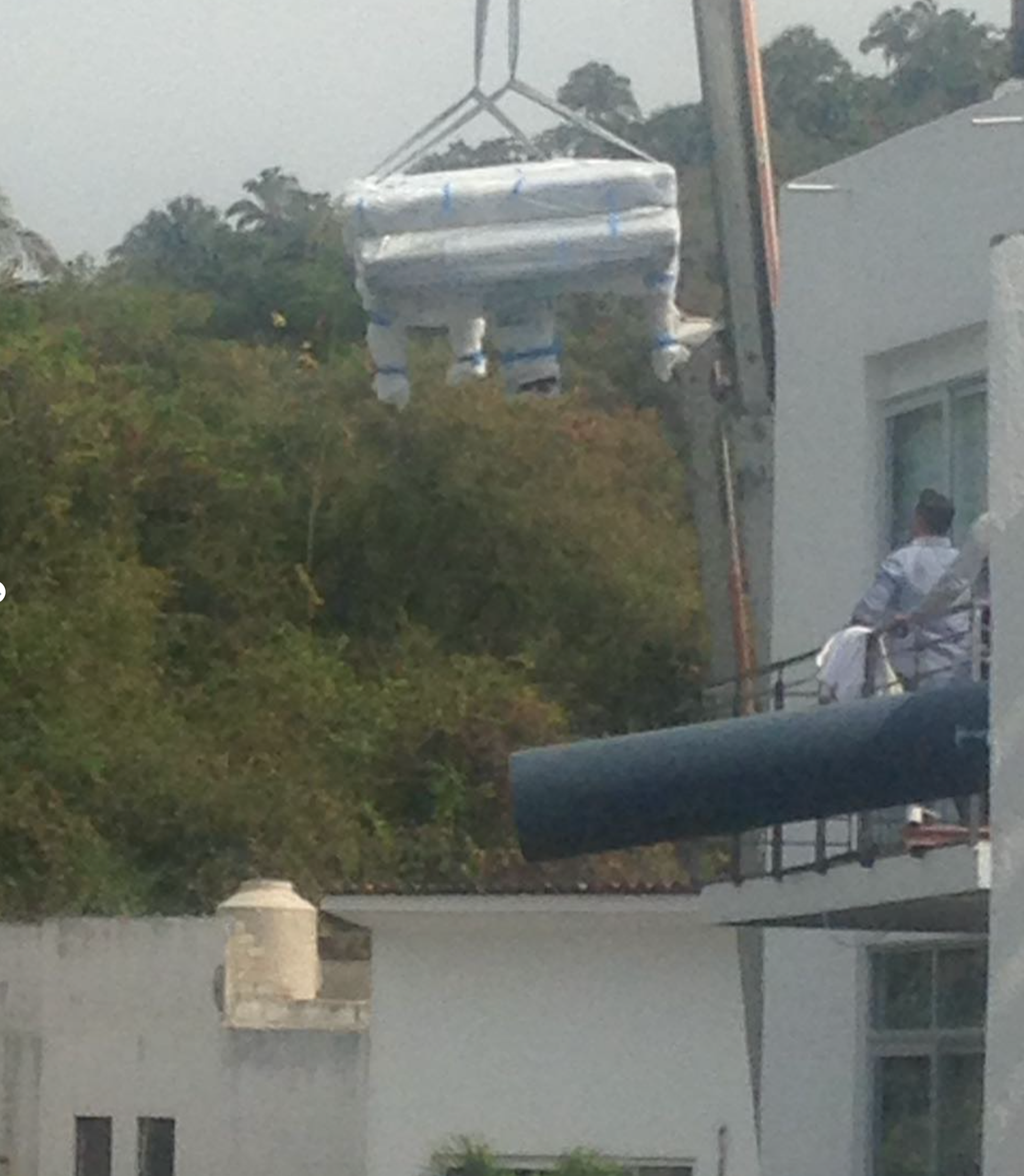Joe Sanchez moving our piano our of our home