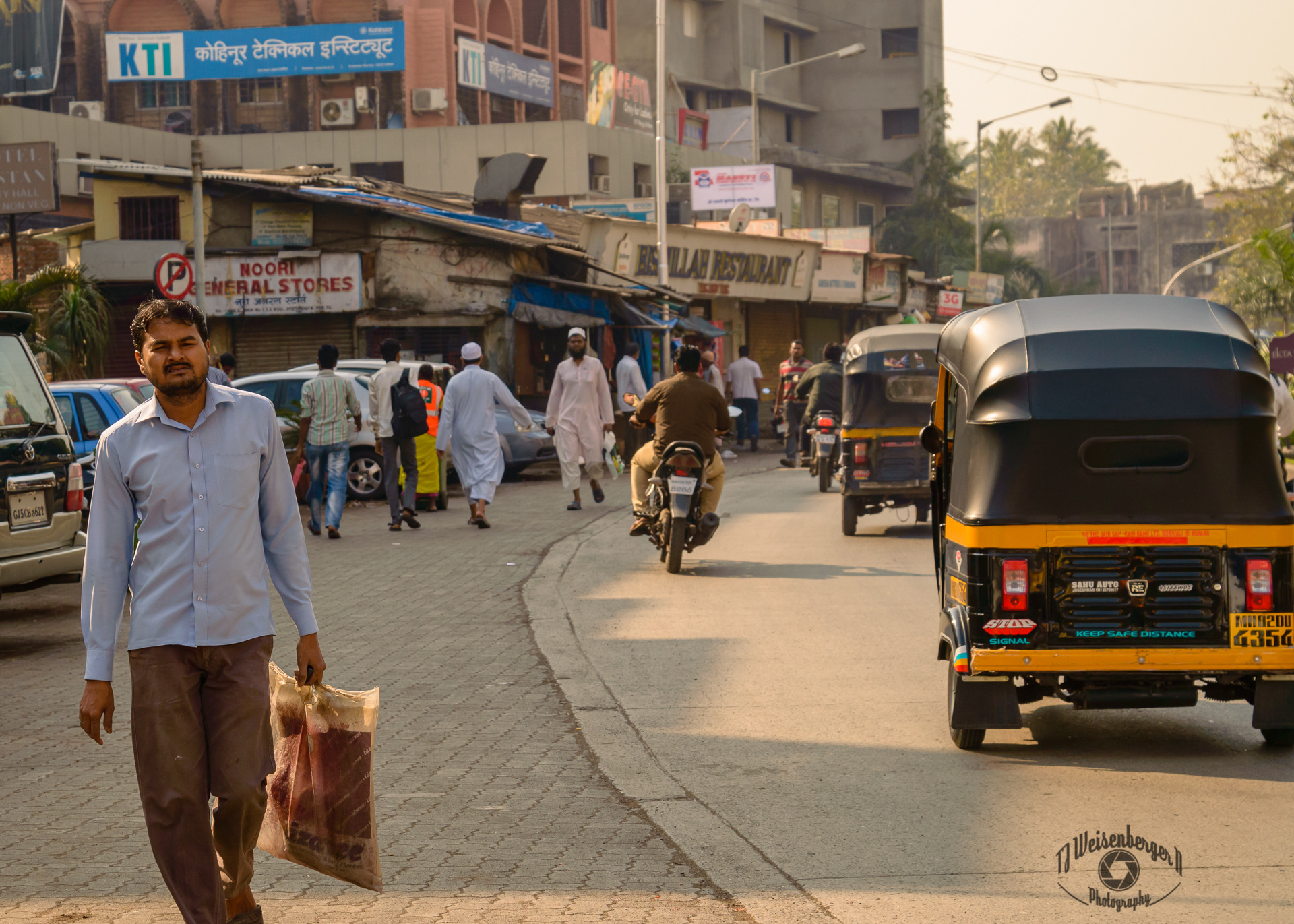 Evening on the Streets of Bombay - Mumbai, India; Bombay; India; Mumbai; People; Tourism; Travel Destinations; Tuk Tuk; afternoon; busy; street photography; tired; T.J.; TJ; Weiseberger