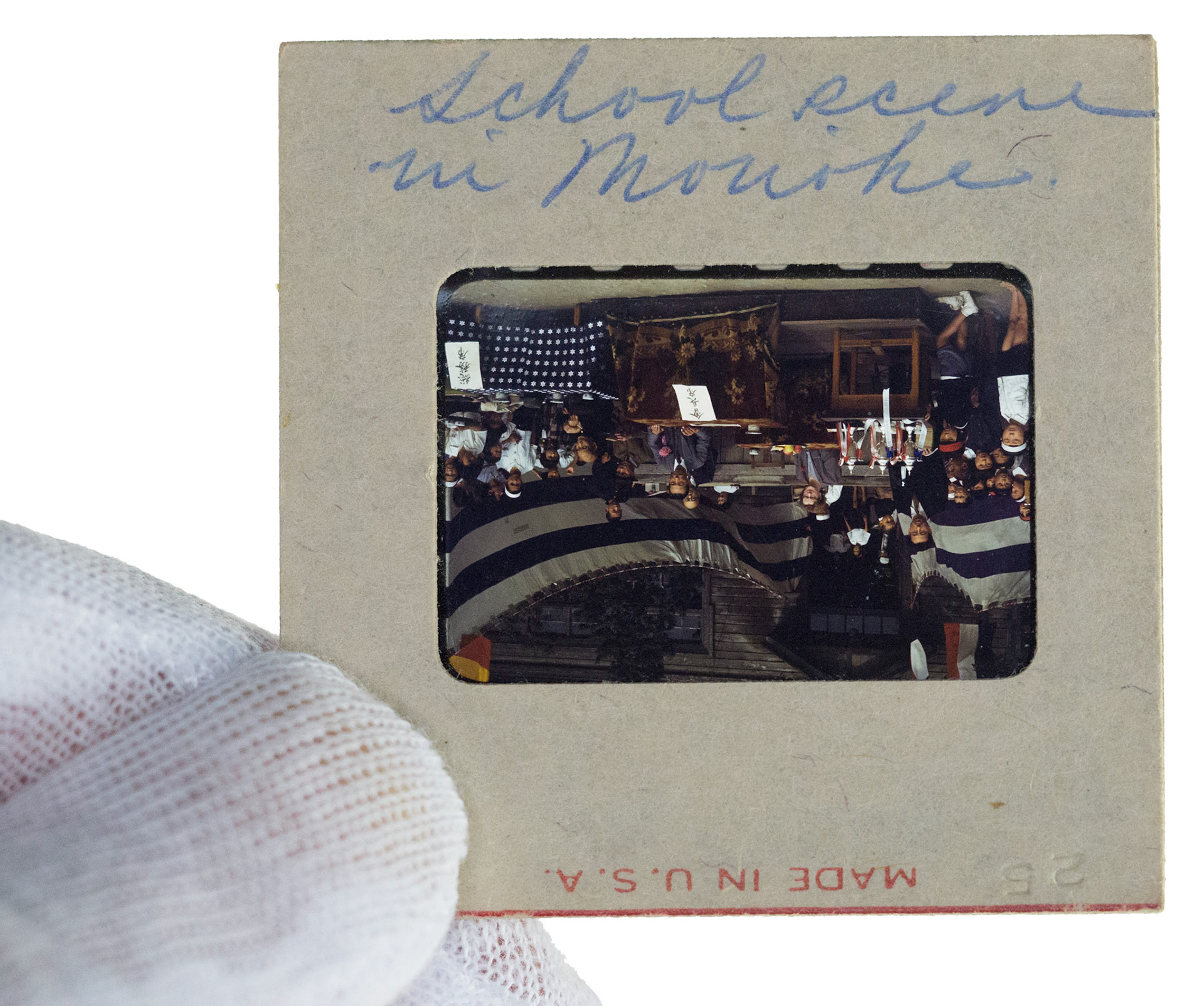 On the back of each slide my grandmother wrote a description. On some prints I add my comments under the description.