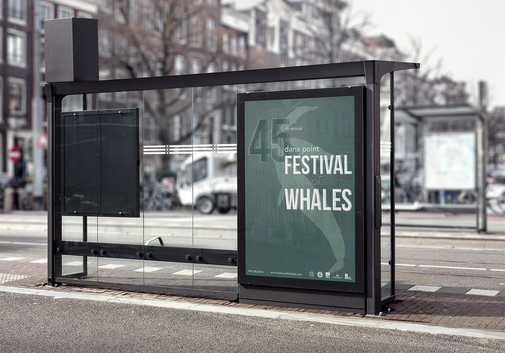 Mockup of Festival of Whales poster as a bus shelter ad