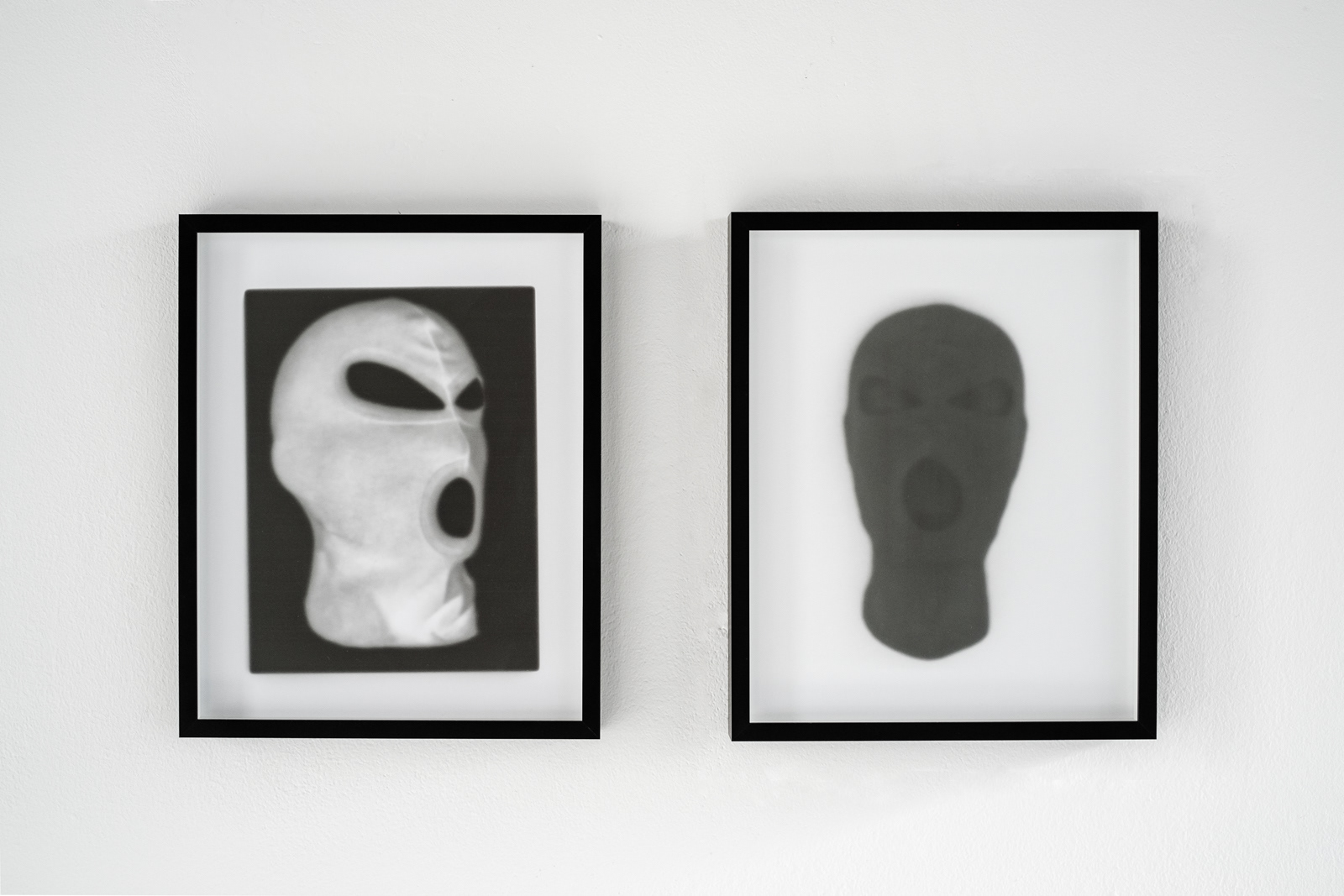 Exhibition installation by martin seeds of terrorist ski mask photographs Northern Ireland terrorism