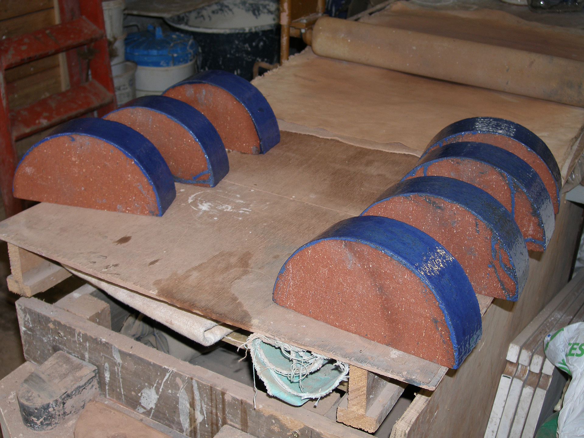 Blue-glazed bricks for top of a wall