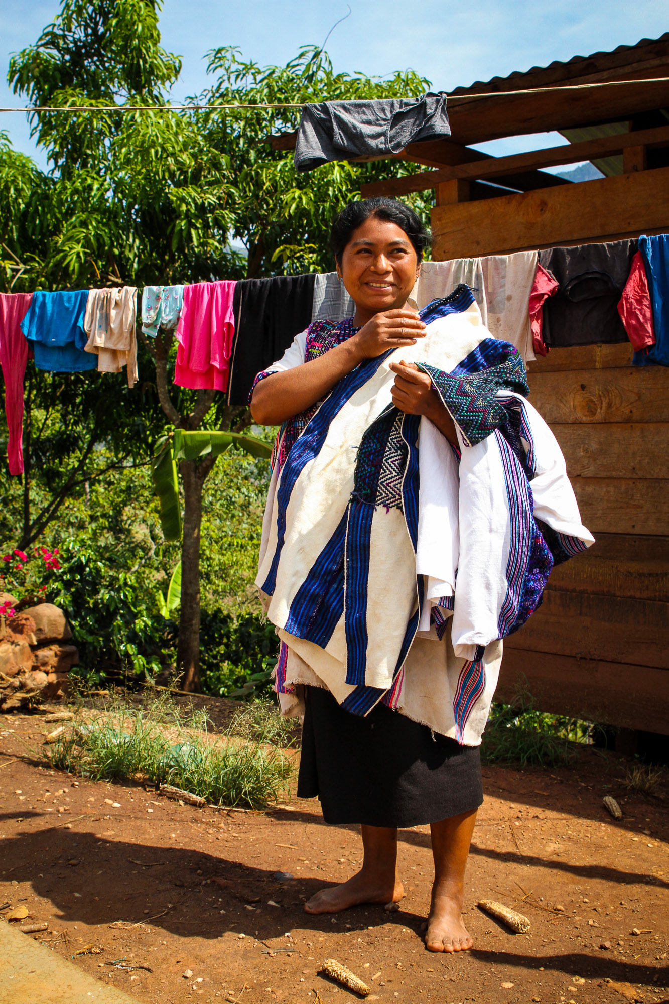 Juana brings out her weavings
