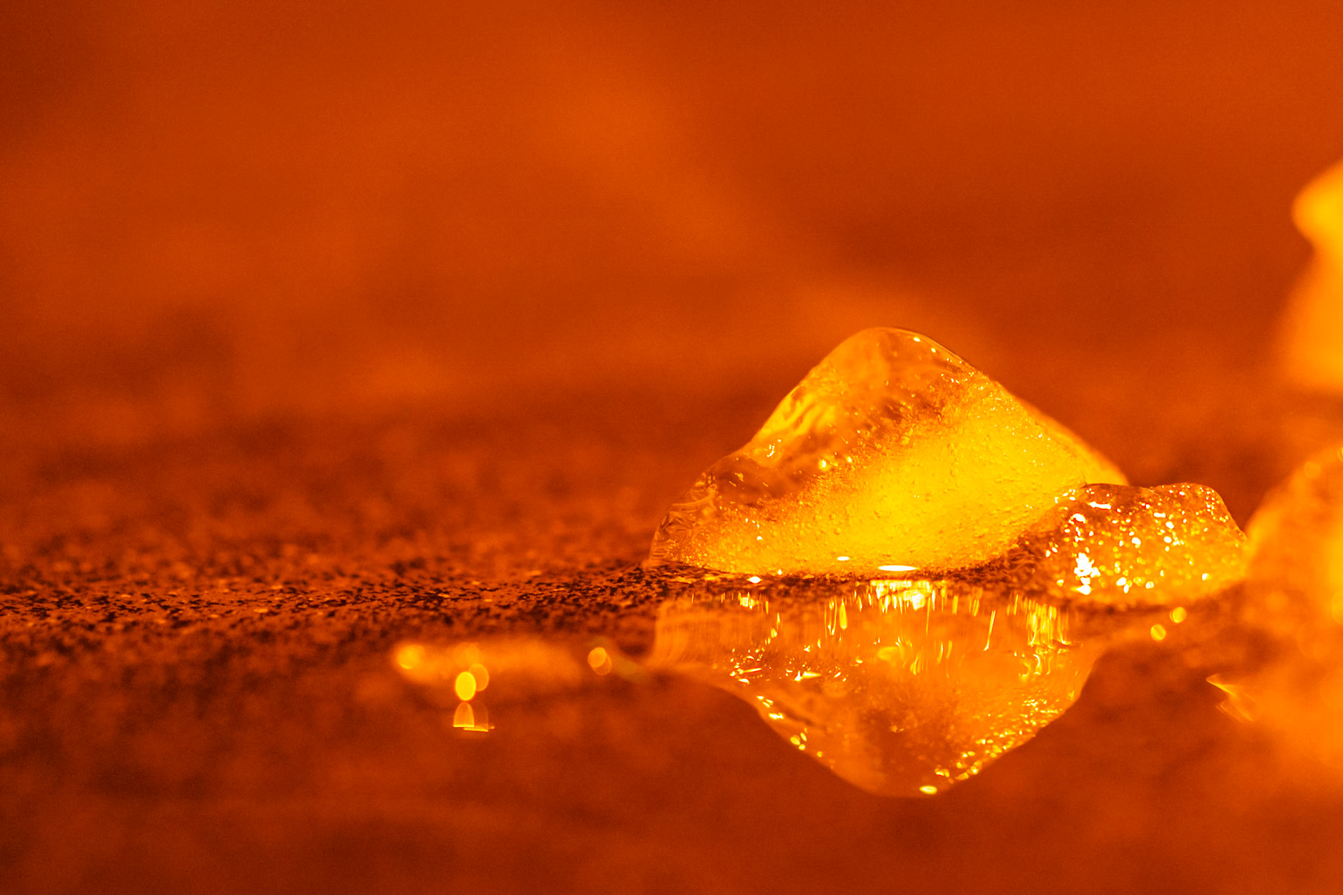 Orange and yellow reflected ice pyramid