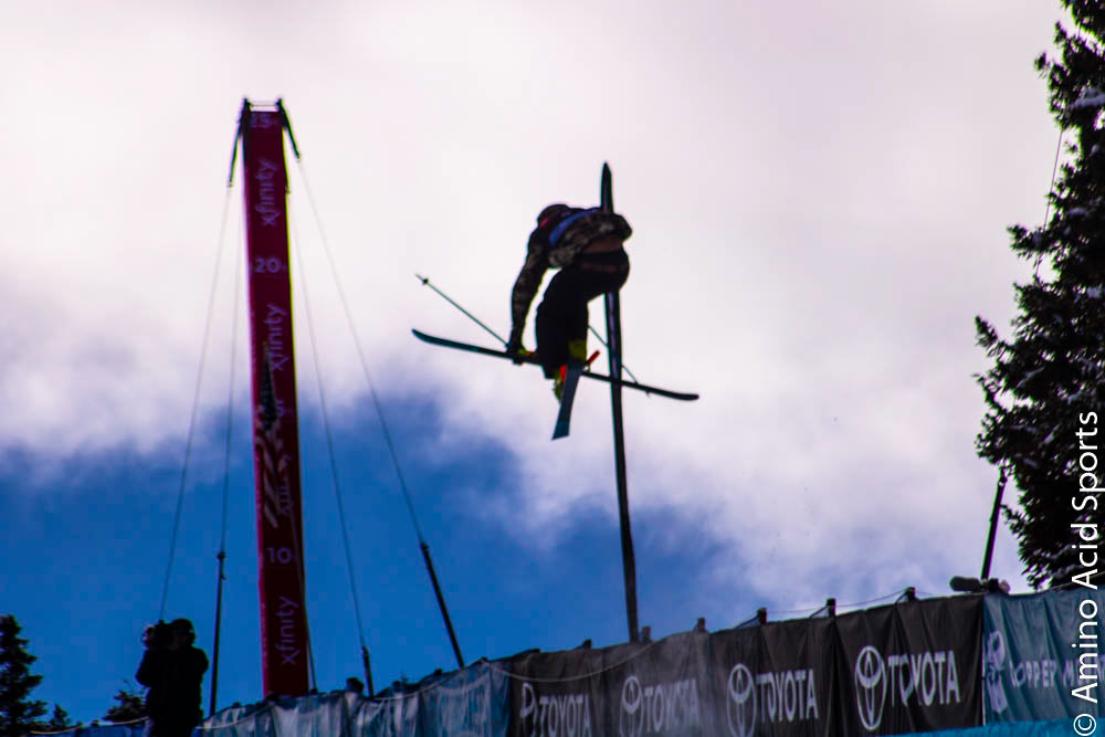 On his 1st Run, Tahoe's David Wise corks his 900* heli mute grab.