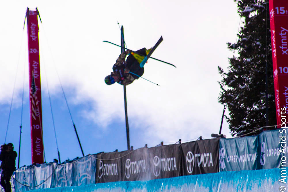 On his 1st Run, Tahoe's David Wise corks his 900* heli mute grab.