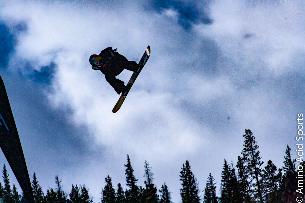 Toby Miller, 19 (USA) , soars his 1st run with a cork front 720* flip.