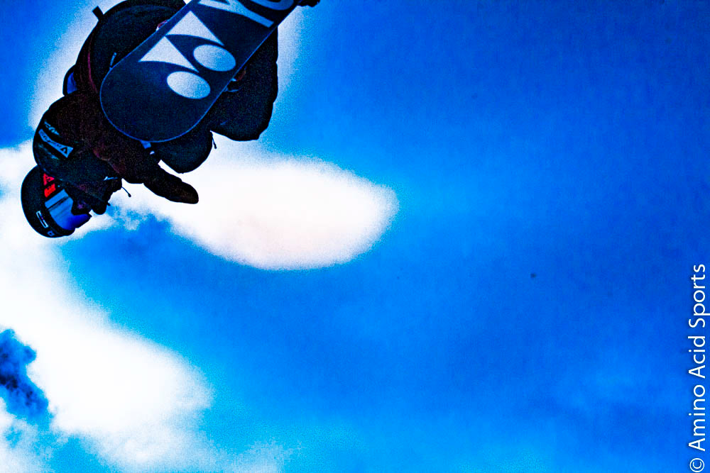 Nippon proud Yuto Totsuka flies outta the halfpipe left wall on his nose grab of his Yonex board