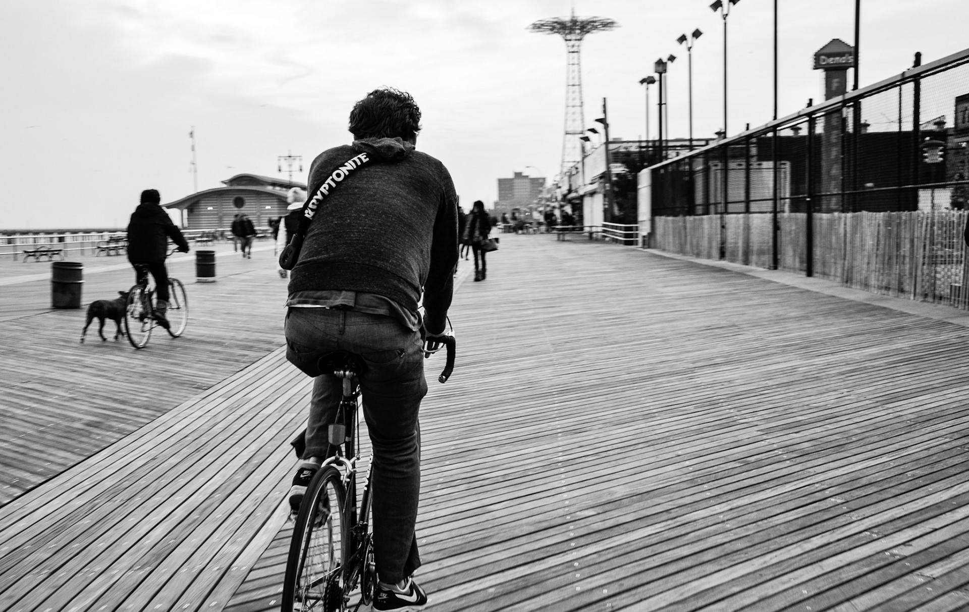 Coney Island - Brooklyn, NY //  Biking down Coney Island's boardwalk in late November.  In 1894, the Coney Island Cycle Path was built to connect Brooklyn's Prospect Park to the beach at Coney Island.  The path ran along Ocean Parkway.  //  11/2010