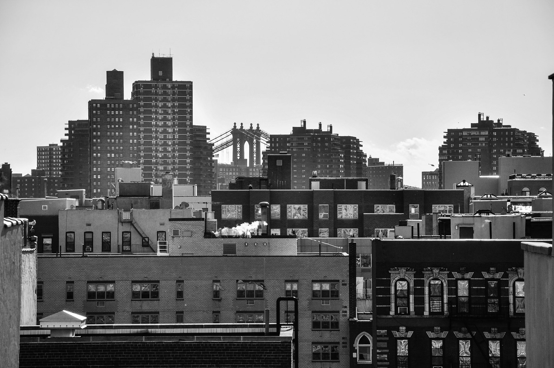 Alphabet City - New York, NY // Looking South from Alphabet City.  The Manhattan Bridge is in the background between the apartment buildings.  // 12/2012
