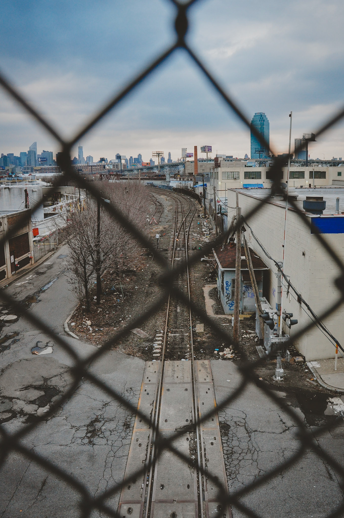 Train tracks many factories and businesses on the way to New York City.