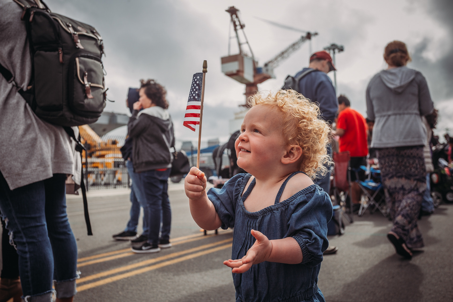 Child waving flag at Military Navy Homecoming Coronado Naval Base San Diego by Morning Owl Fine Art Photography