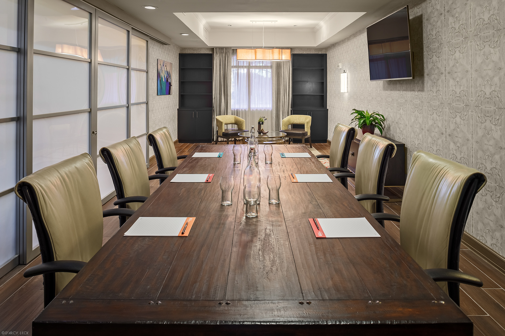 Hospitality photographer D'Arcy Leck photographs a boardroom meeting space of the Hotel Indigo San Antonio Riverwalk