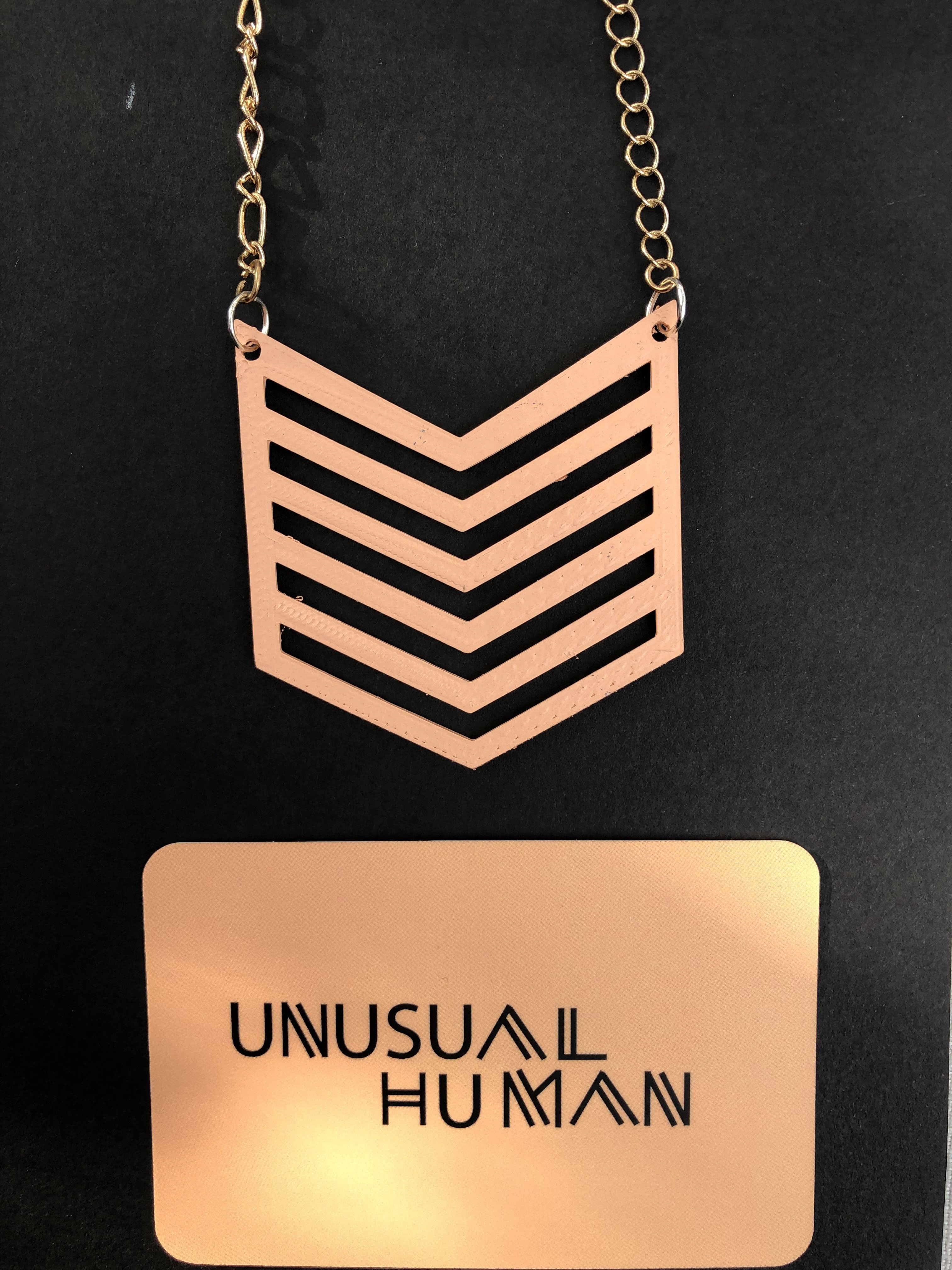 Jewelry designed, 3D printed and painted by me. Logo design also by me, in Adobe Illustrator