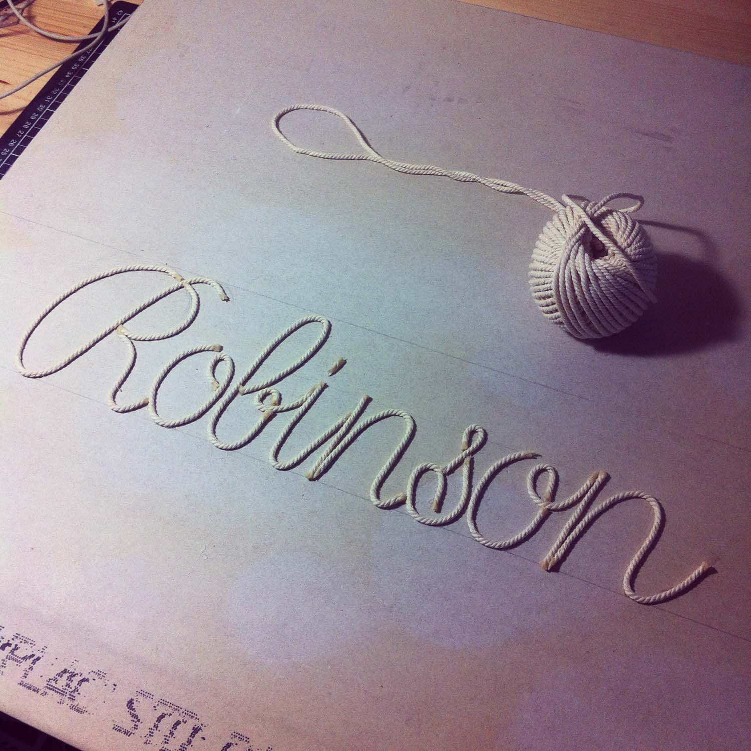 Lettering calligraphie anglaise Robinson fait à partir de corde